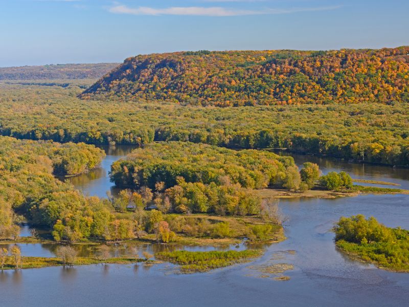 Colorful bluffs above a river confluence in fall