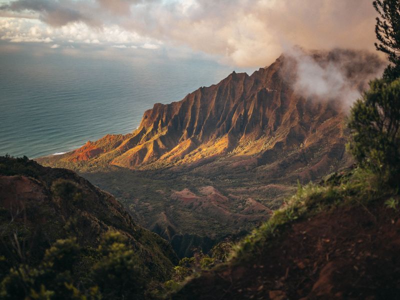 mountains next to ocean