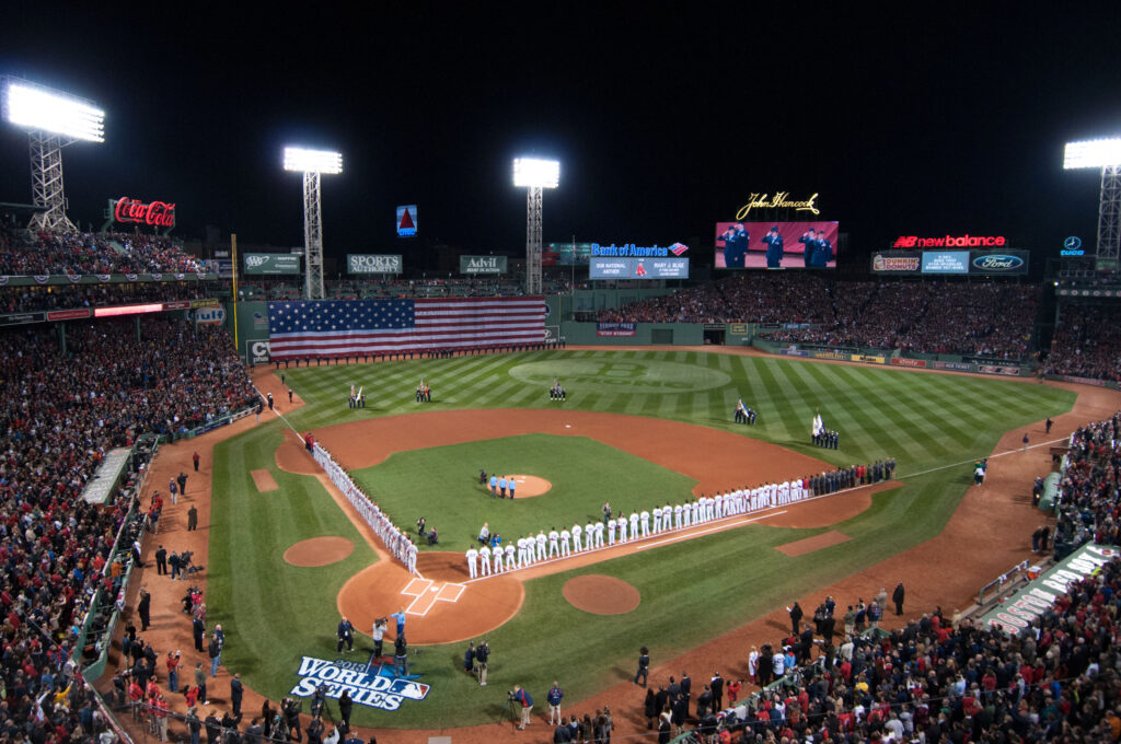 Fenway Park at night with Bobby Dalbec batting